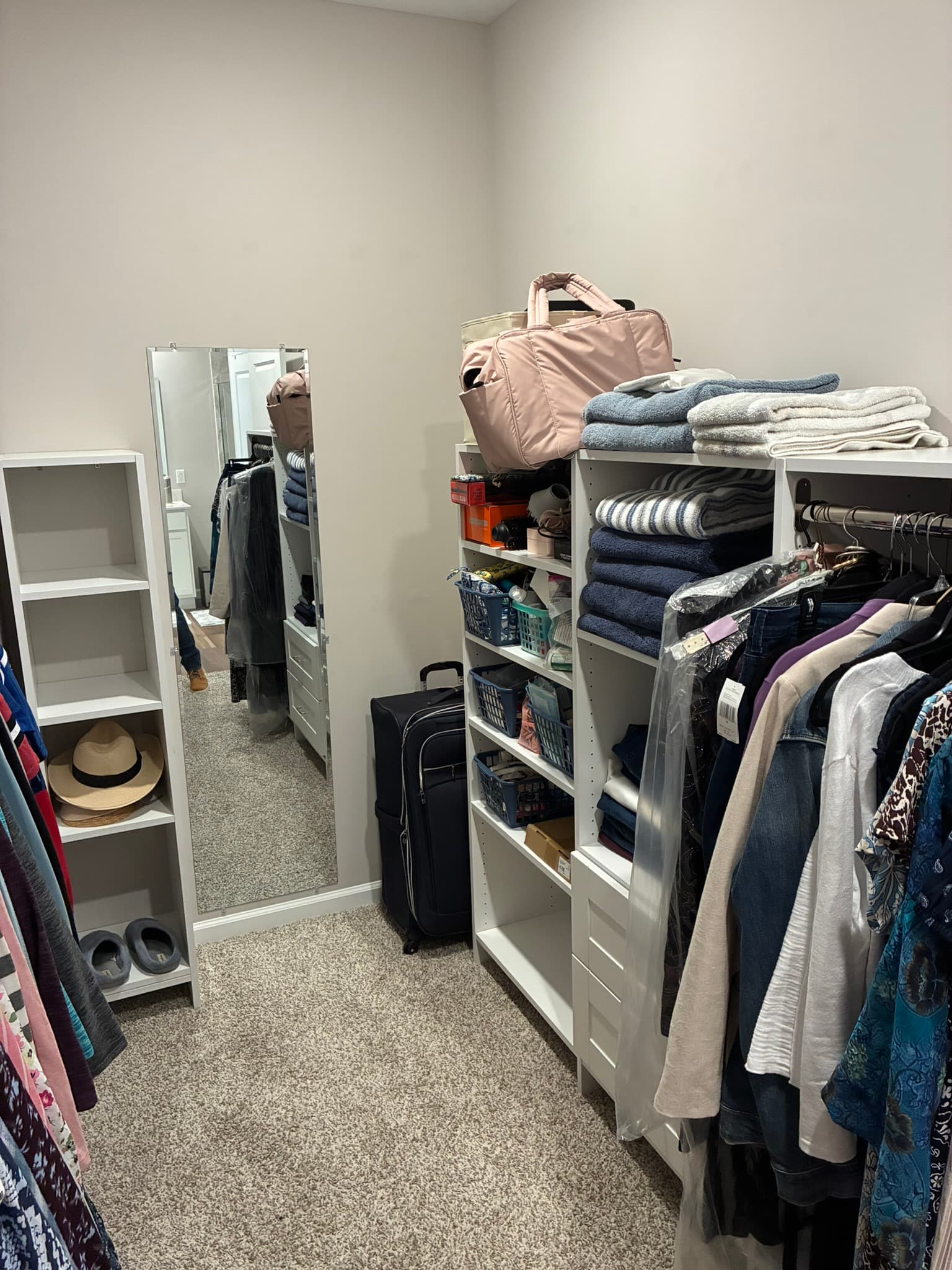 Finished closet remodel shelving and storage