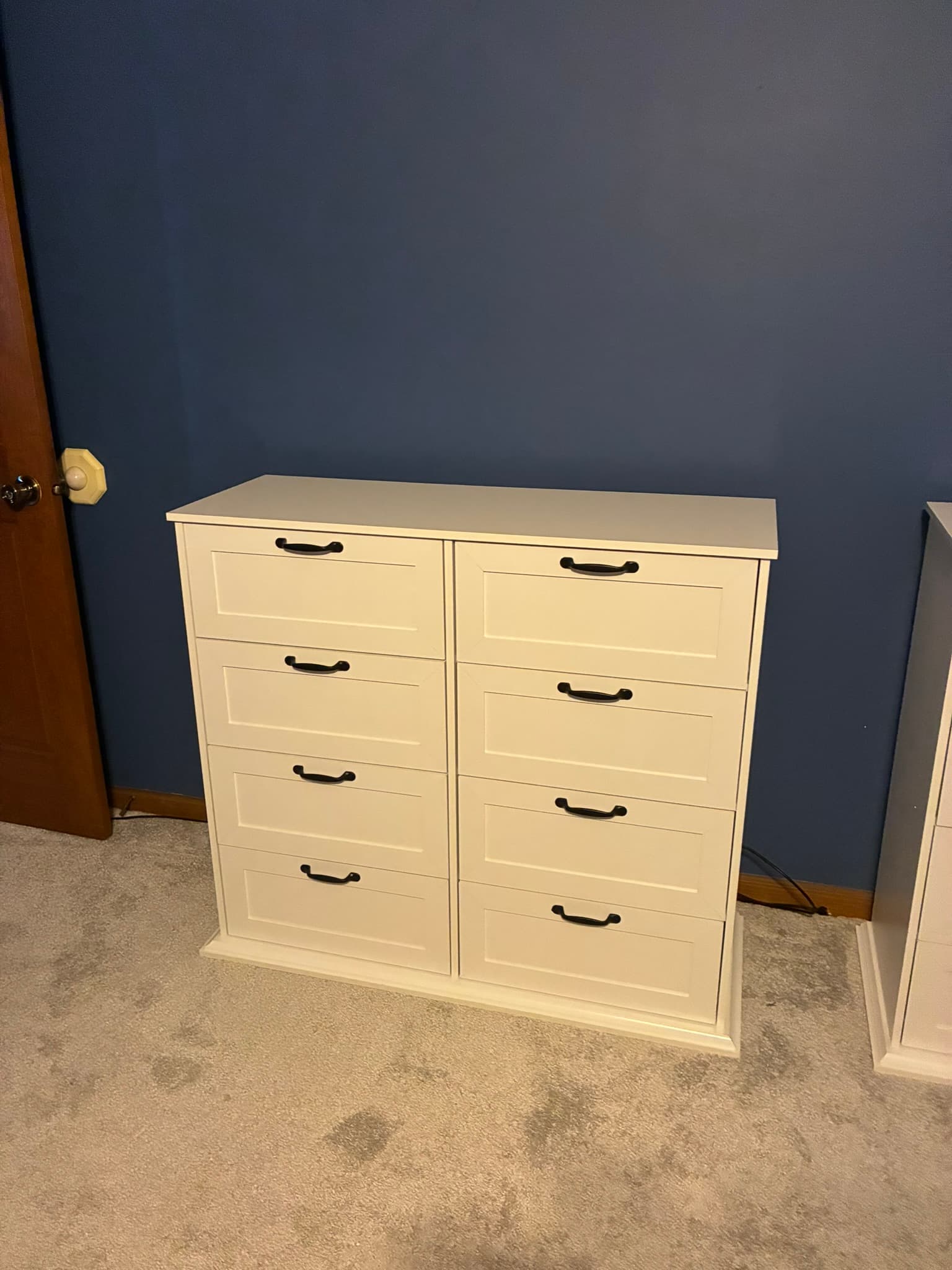 Assembled white dresser with drawers