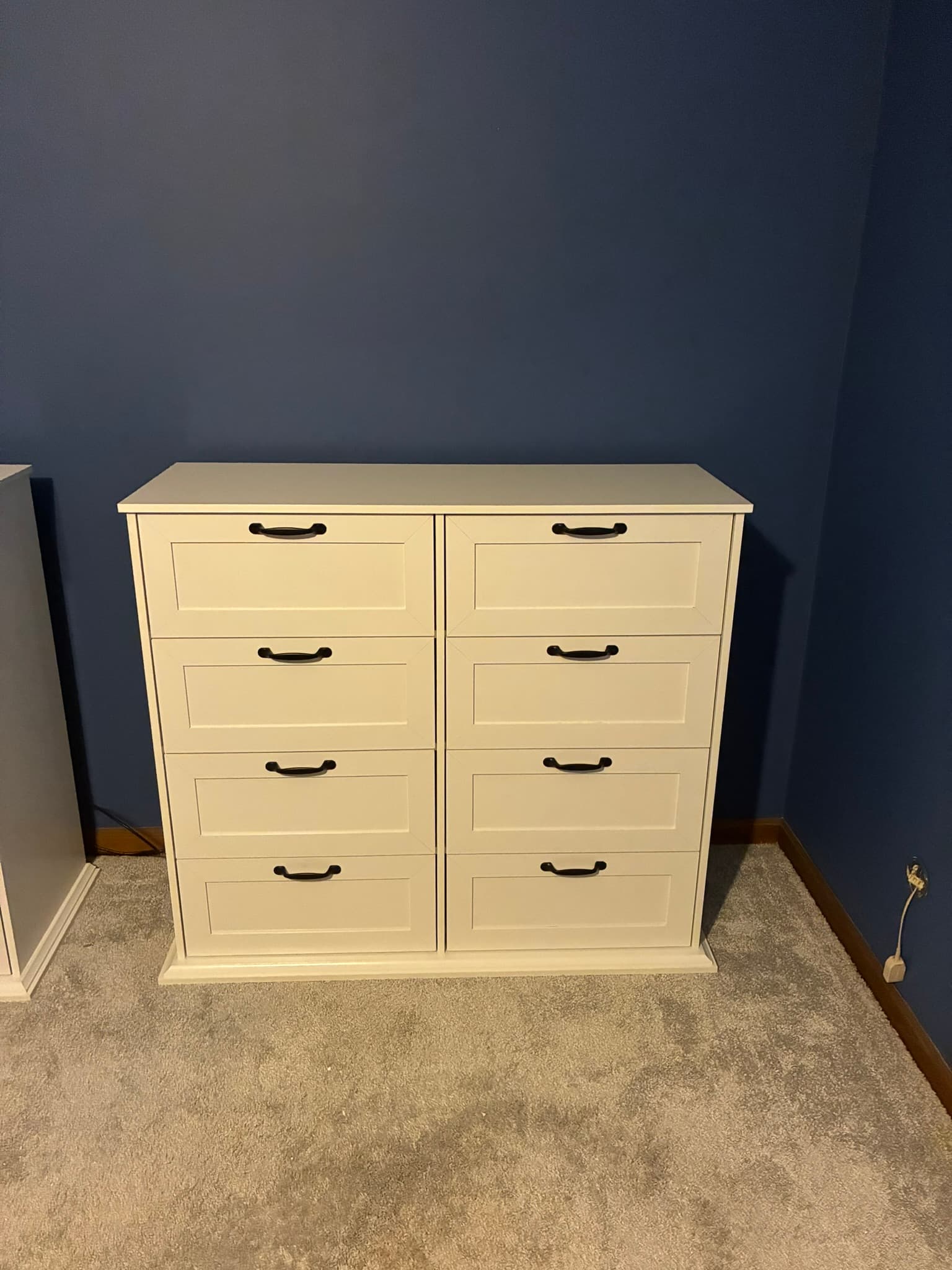 Second assembled white dresser with drawers